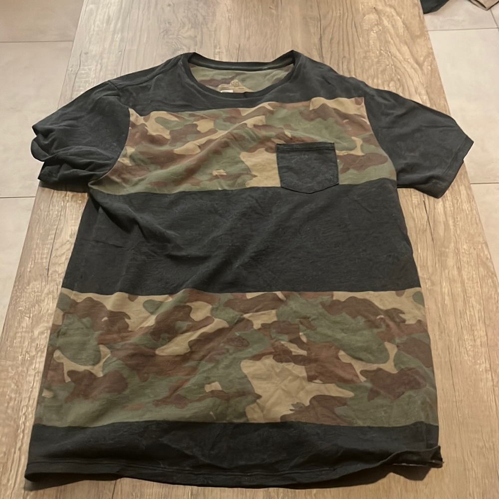 On the byas (urban outfitter) camo shirt… great fit